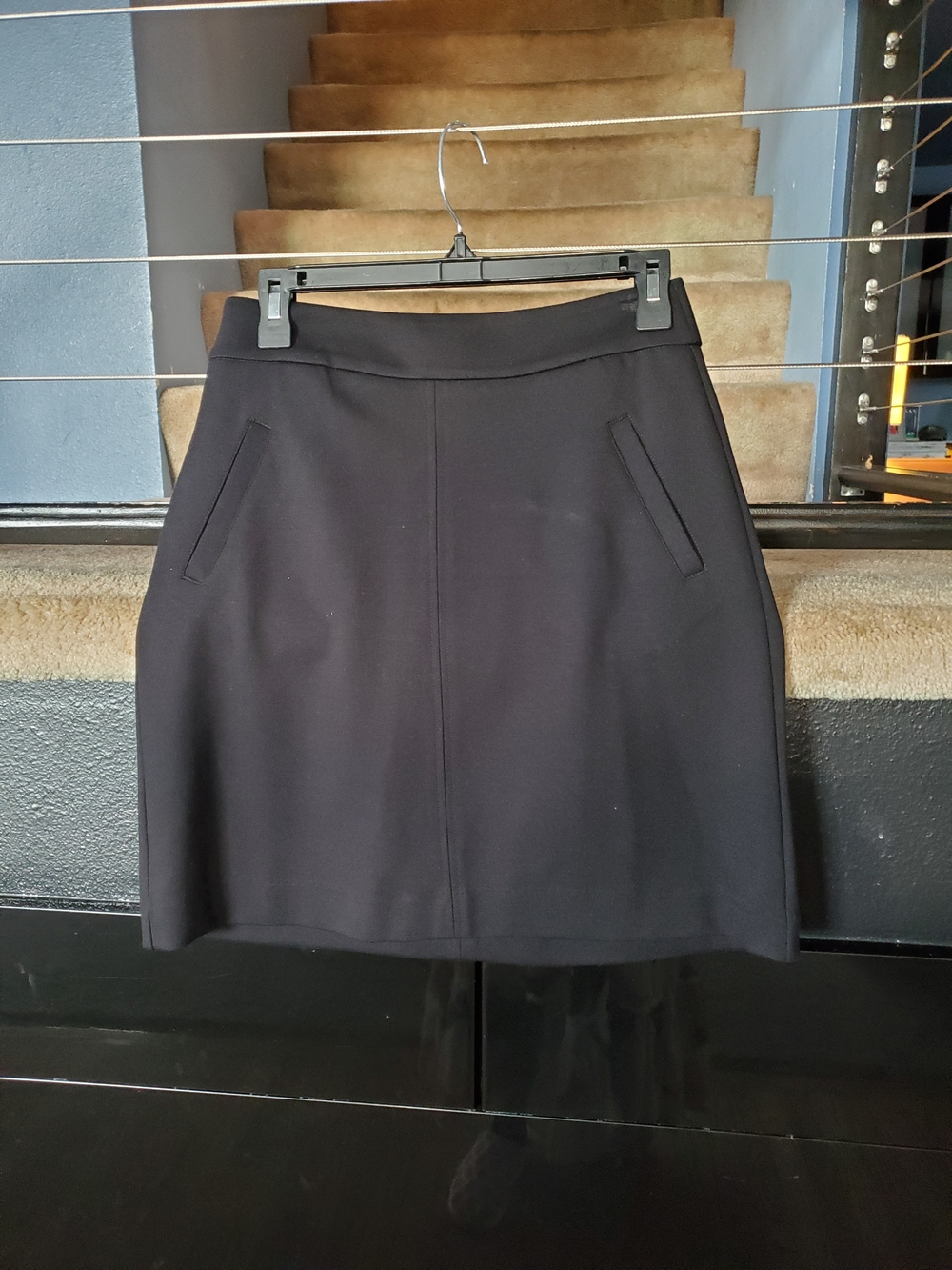 CAbi Black A-Line Skirt with Front Slant Pockets